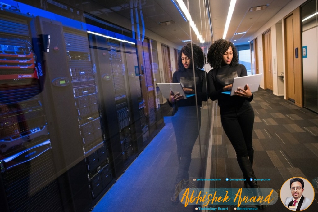 woman in black top using Surface laptop